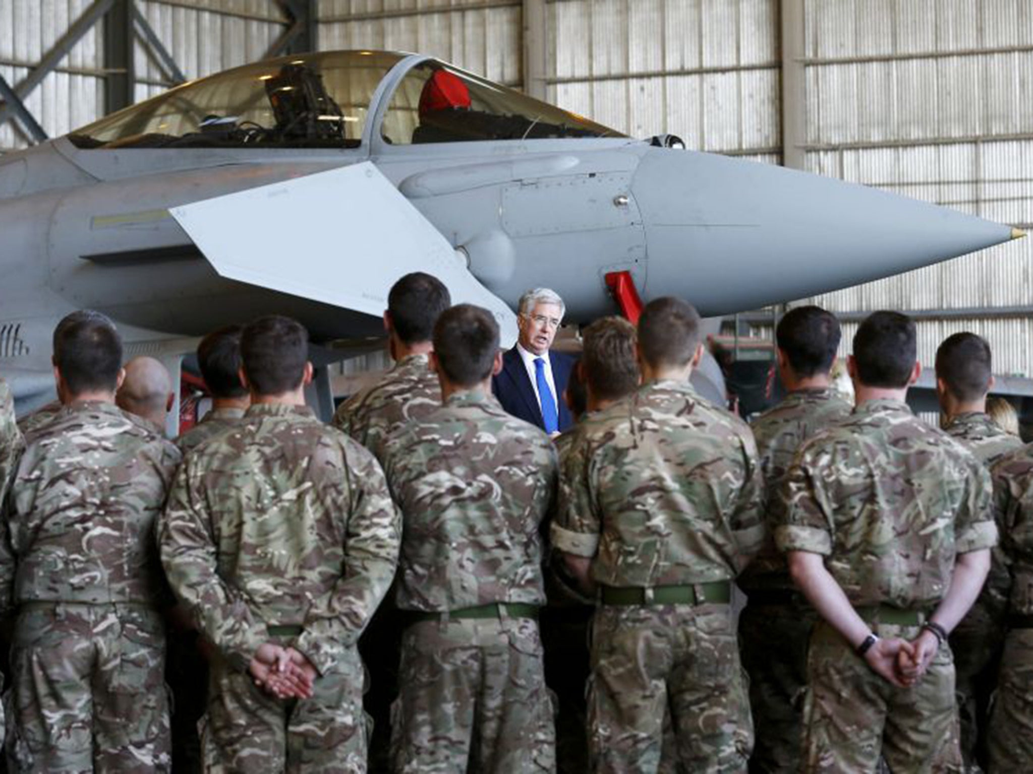 Michael Fallon, the Defence Secretary, speaks to RAF personnel in Cyprus