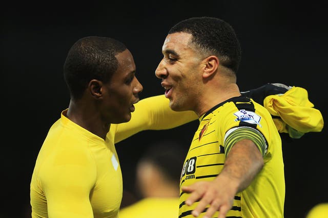 Odion Ighalo and Troy Deeney celebrate after the former scores for Watford