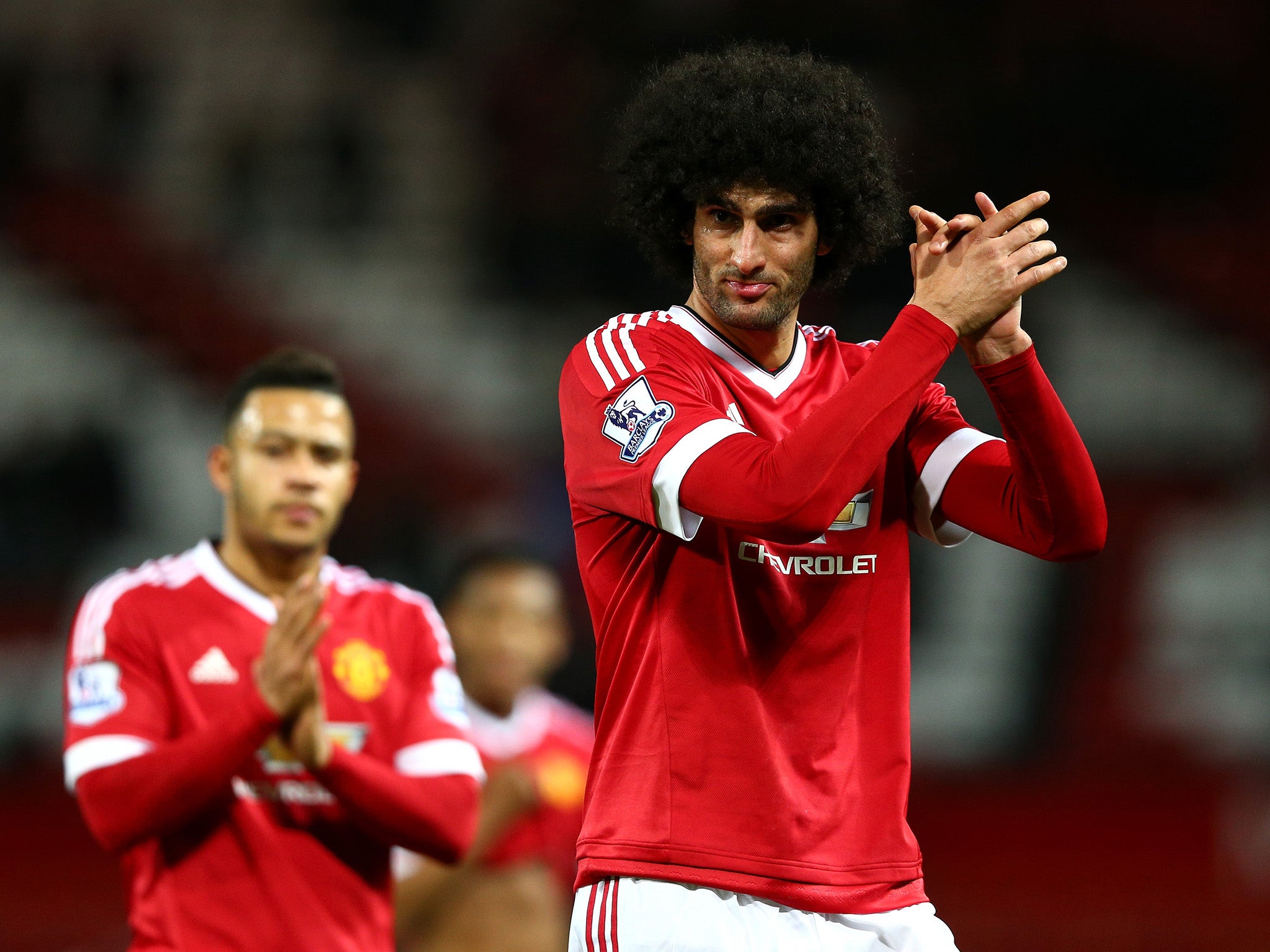 Marouane Fellaini leaves the pitch after the full-time whistle