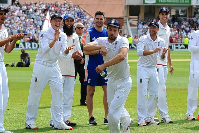 Mark Wood performs his imaginary horse act, to the delight of his team-mates