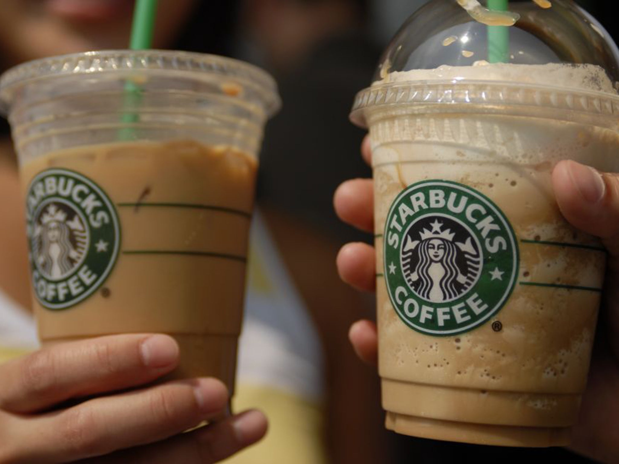 Why is the coffee machine in Starbucks in the front and not in the back of  the stand? - Quora