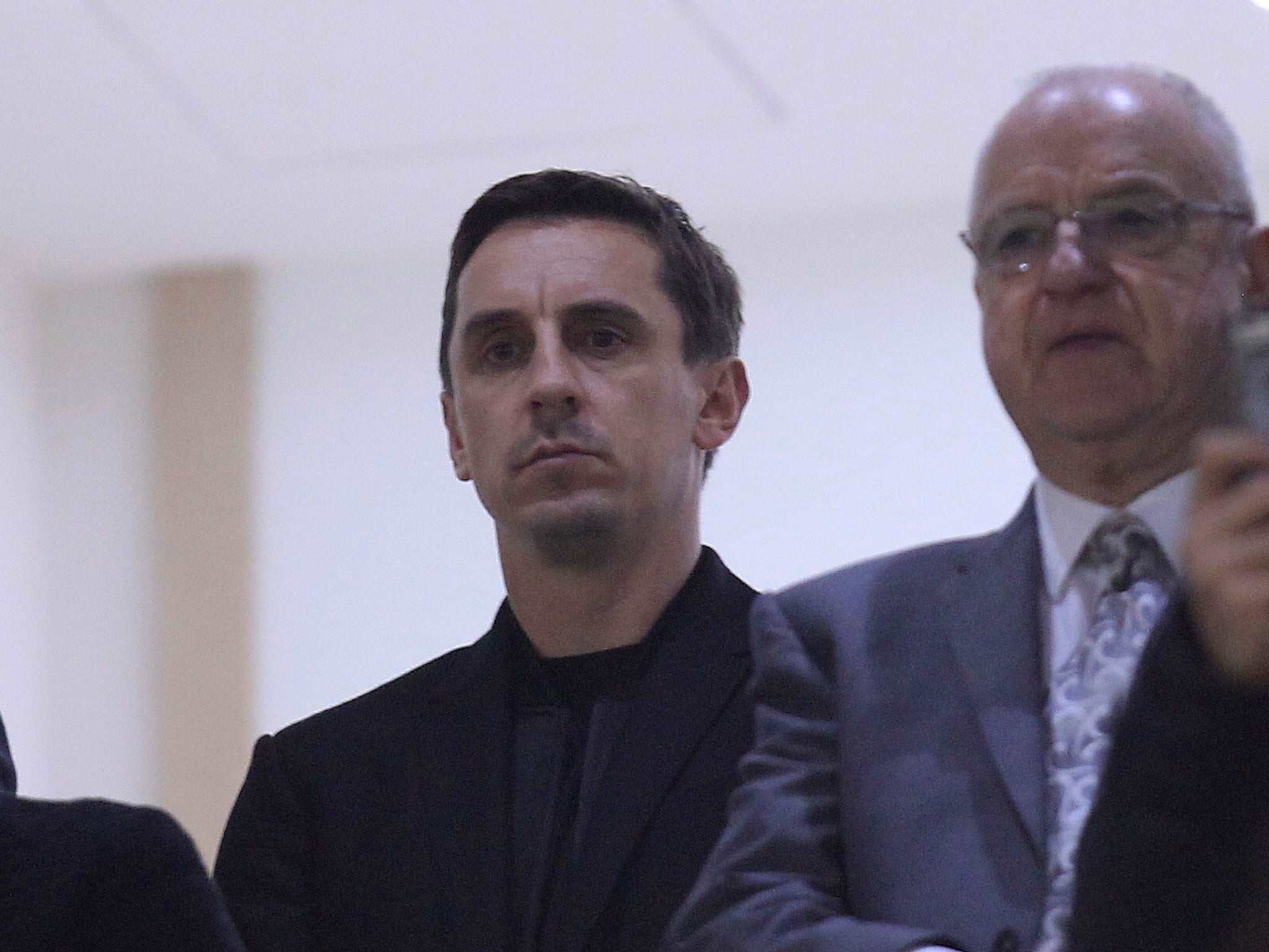 Brother Gary Neville watches the game from owner Peter Lim’s box