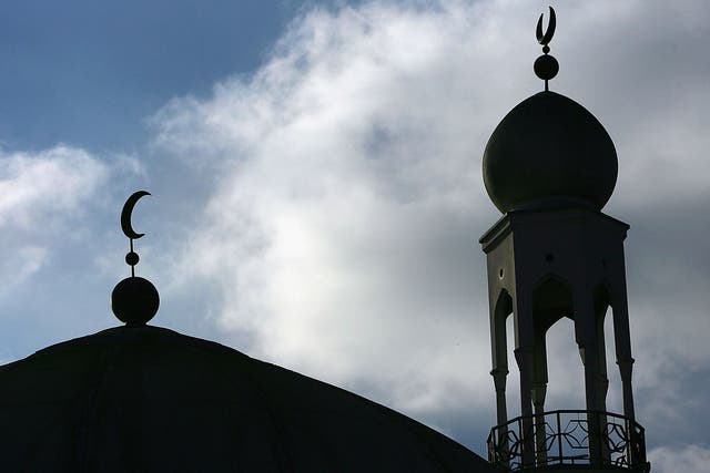 The minaret and dome of the Birmingham Central Mosque, where one of Britain’s sharia courts is located