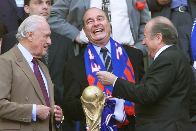Jacques Chirac, centre, the French President at the time, shares a joke with the current and former Fifa presidents Sepp Blatter and Joao Havelange, left, in the Stade de France in Paris, before the 1998 World Cup final between Brazil and France