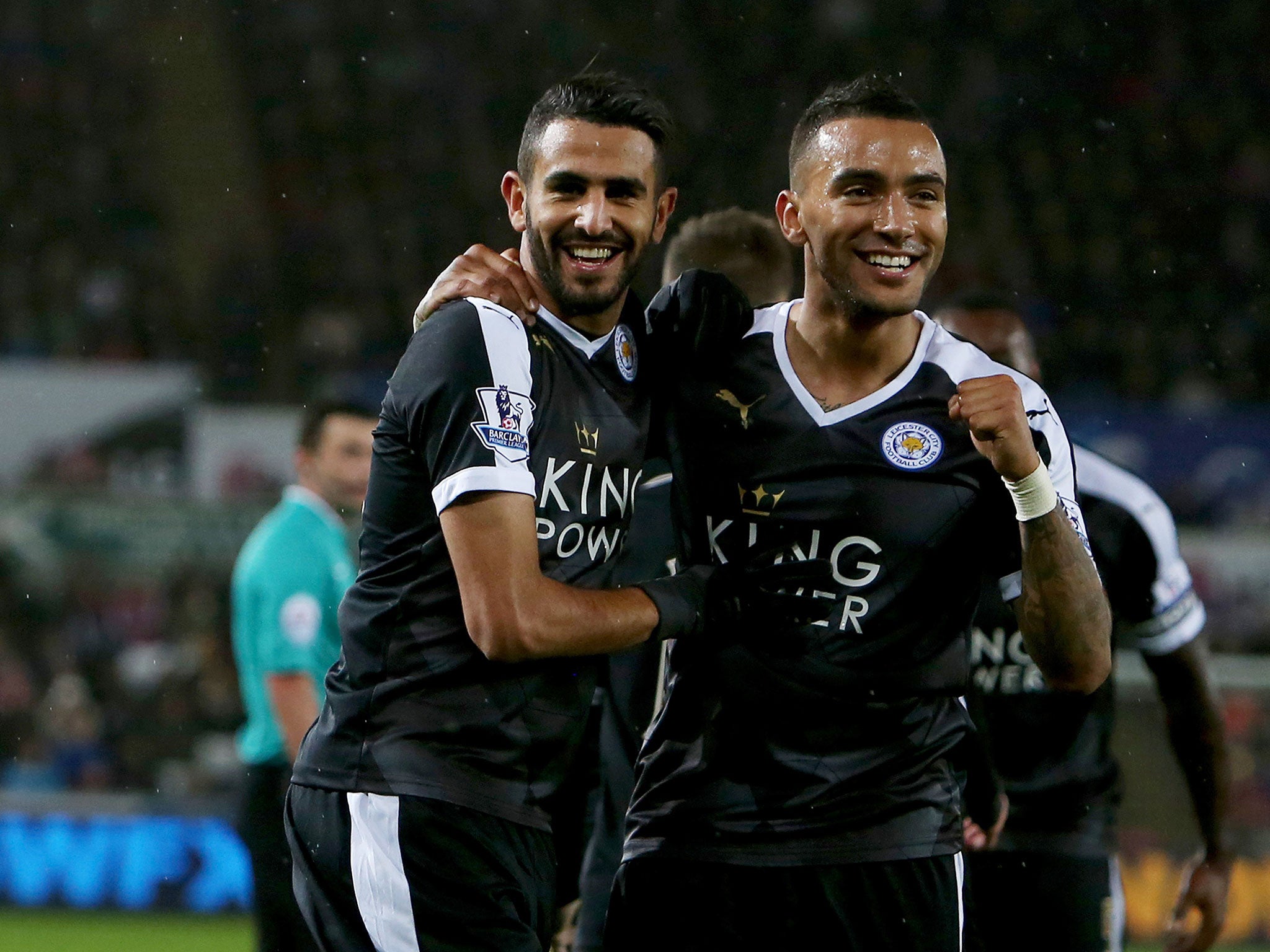 Riyad Mahrez celebrates with Leicester team-mate Danny Simpson after scoring a hat-trick against Swansea