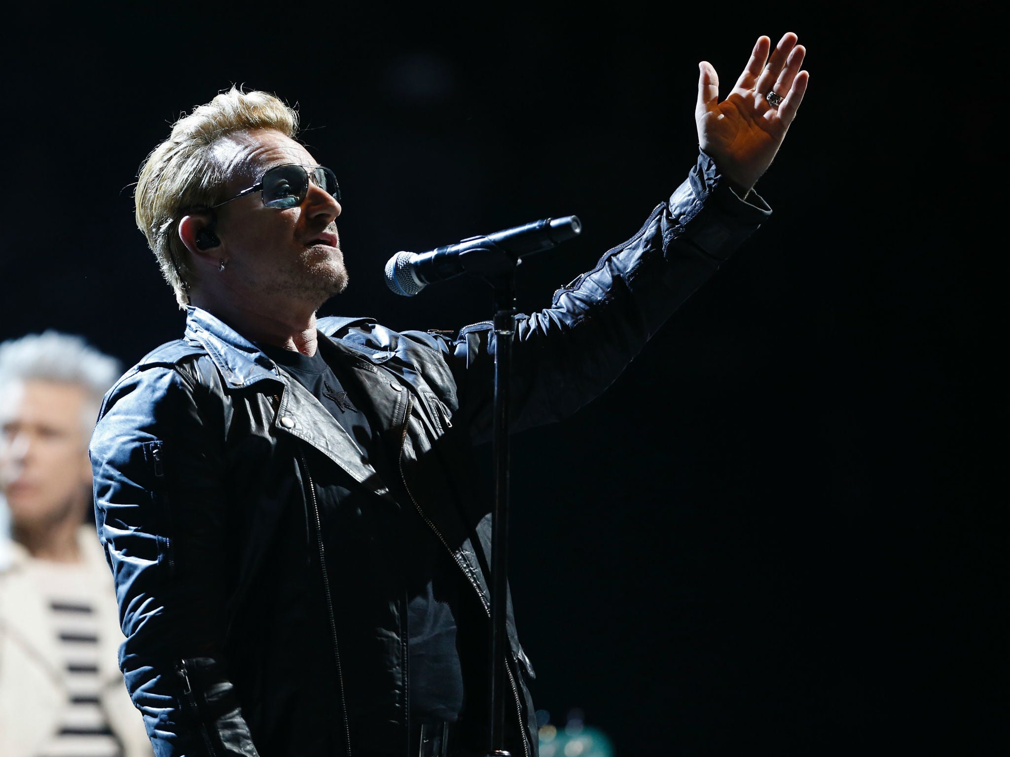 Bono performs with U2 in Paris on Sunday 6 December
