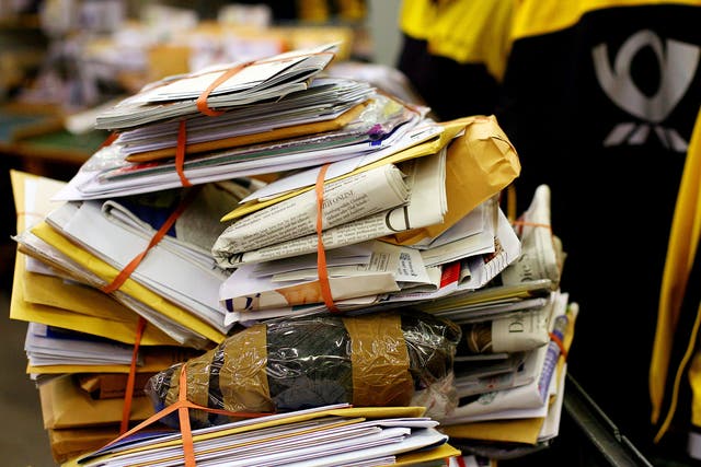 Letters piled up at the letter sorting center of German logistics giant Deutsche Post in Cologne, western Germany.