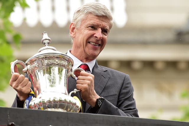 Arsene Wenger with the FA Cup trophy