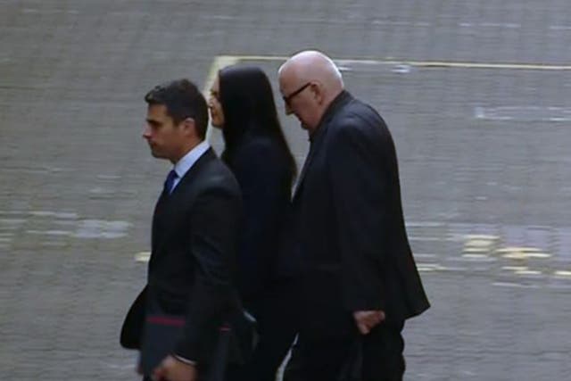 Harry Clarks, right, leaving court. The 58yr old was unconscious when his bin lorry veered out of control on 22 December 2014, killing six people