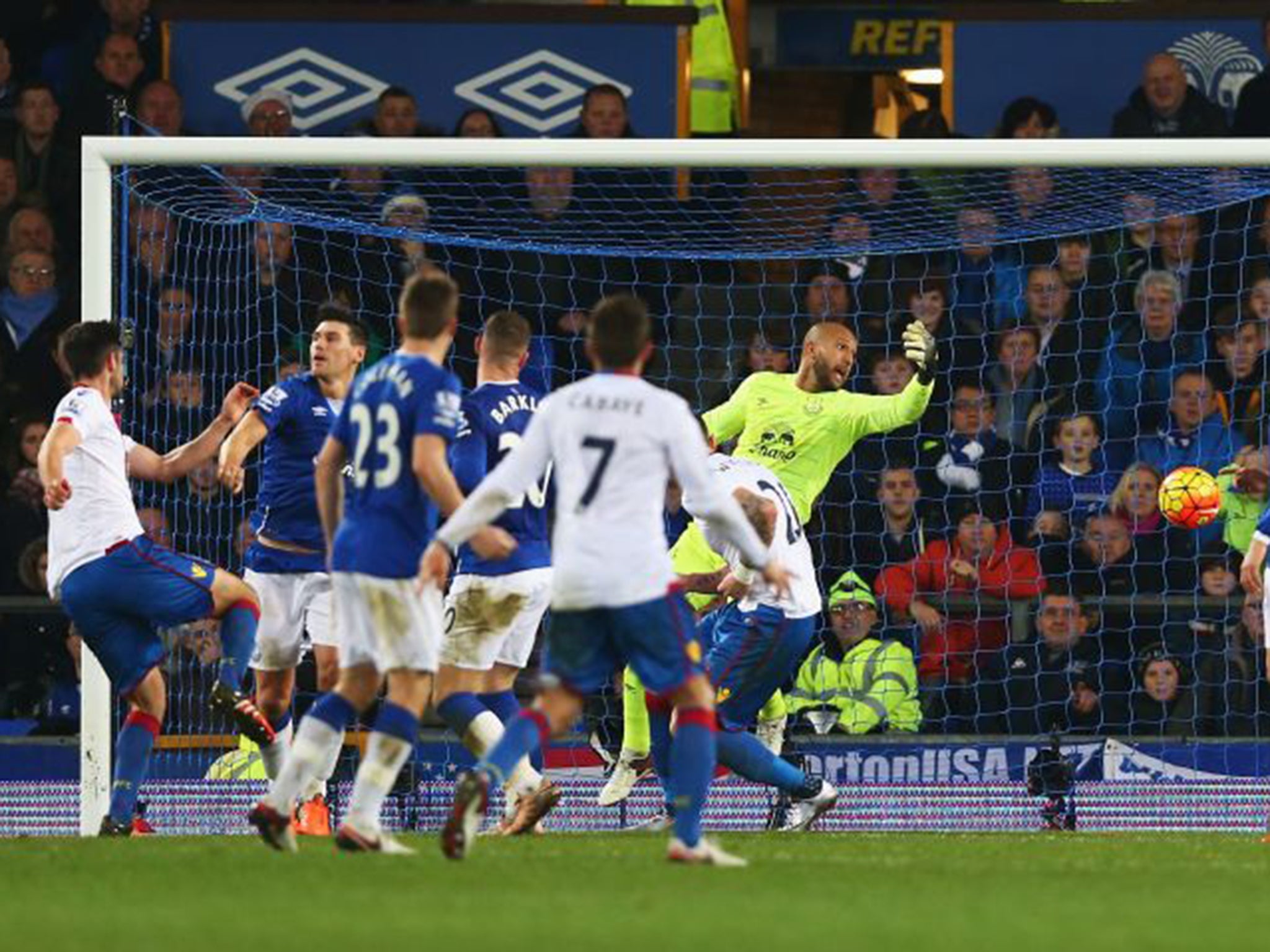 &#13;
Scott Dann, far left, slots the ball past a hapless Tim Howard to give Palace the lead &#13;