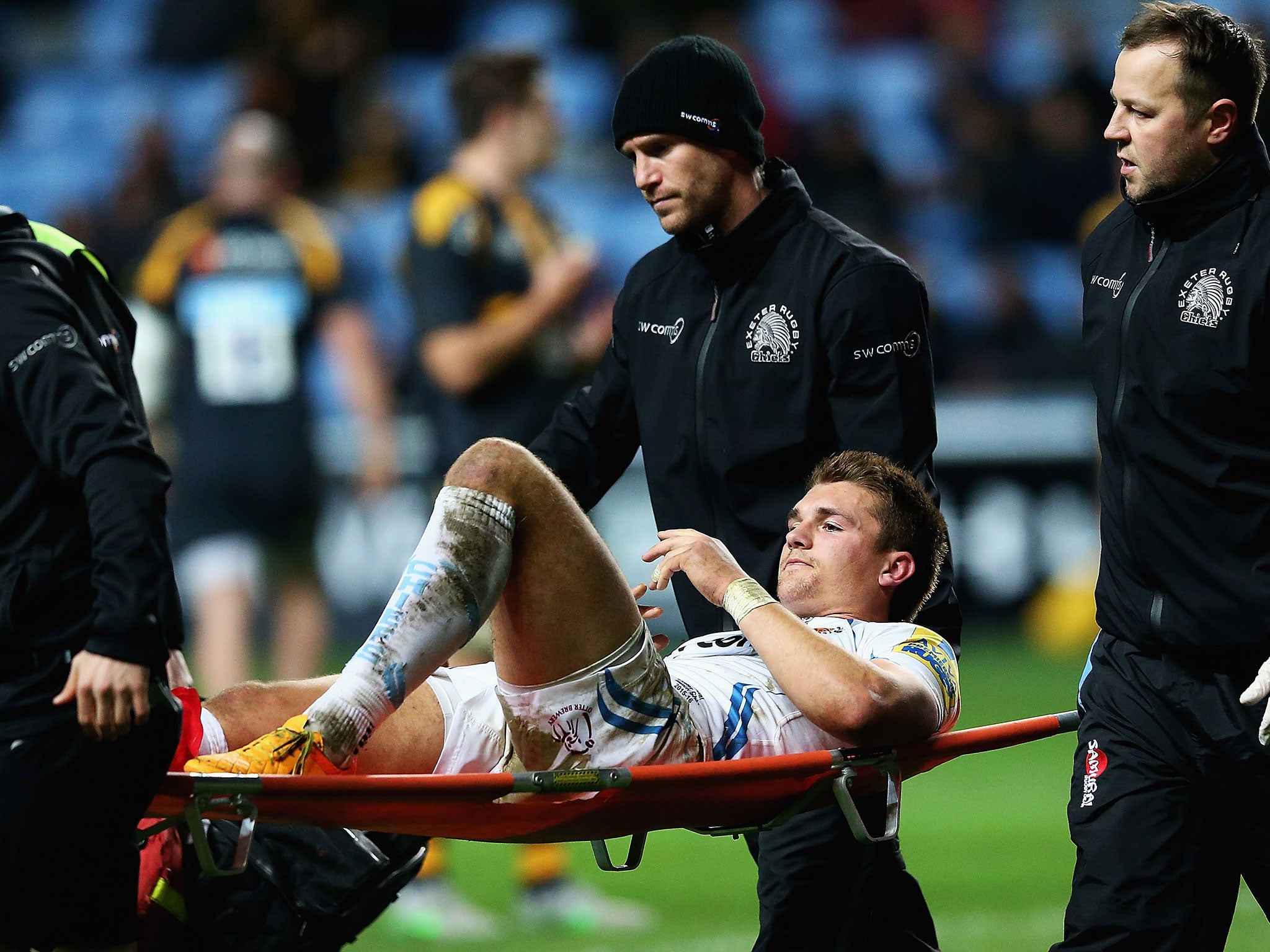 Exeter Chiefs centre Henry Slade has suffered a broken leg and damaged ankle