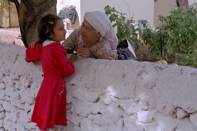A Turkish girl greets her grandmother