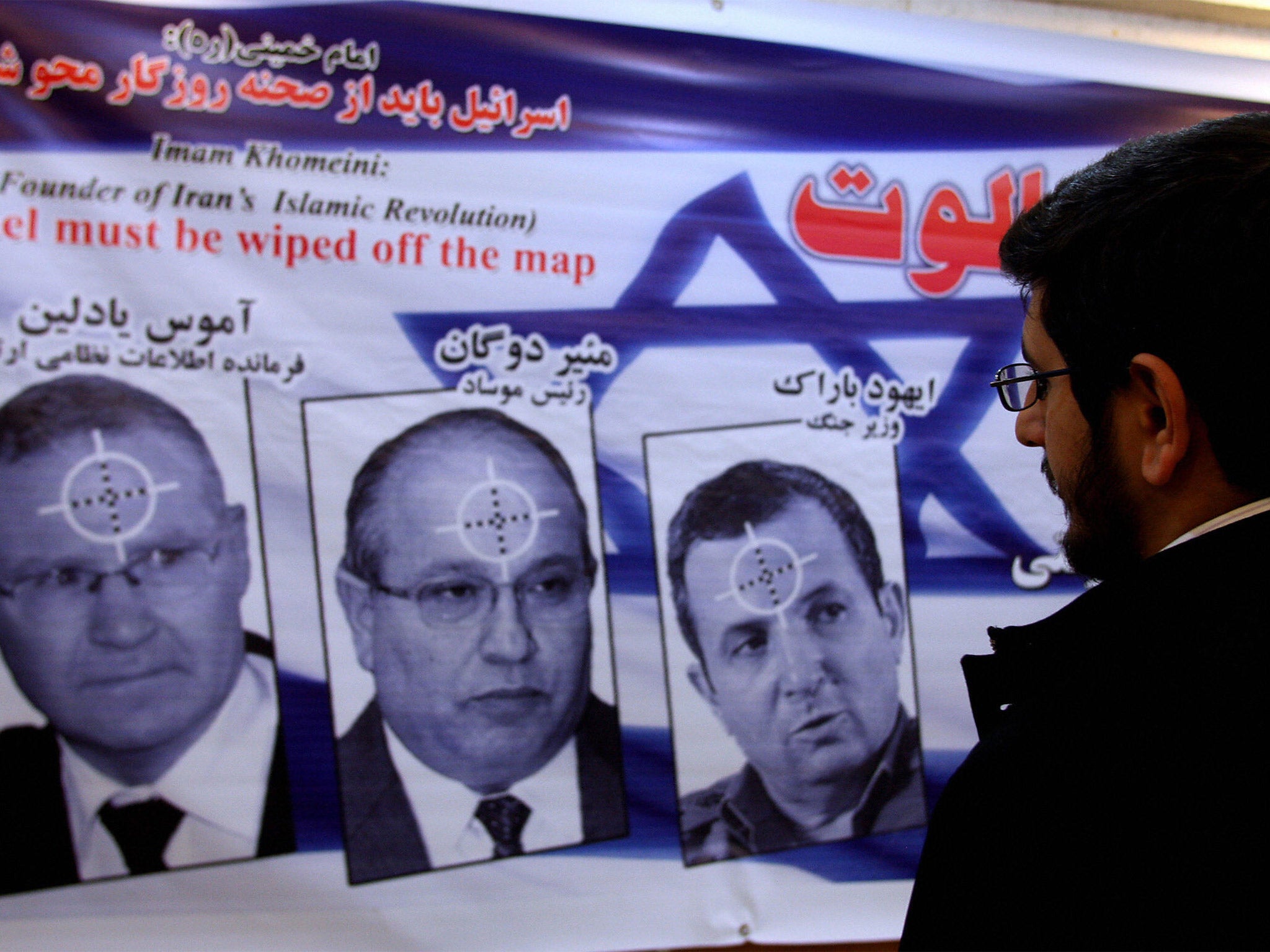 &#13;
Mossad is hated by the regime in Iran, where posters depict its protagonists as targets (Getty)&#13;