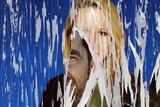 A ripped poster of Front National candidate Marion Maréchal-Le Pen, Marine Le Pen’s more outwardly hardline niece