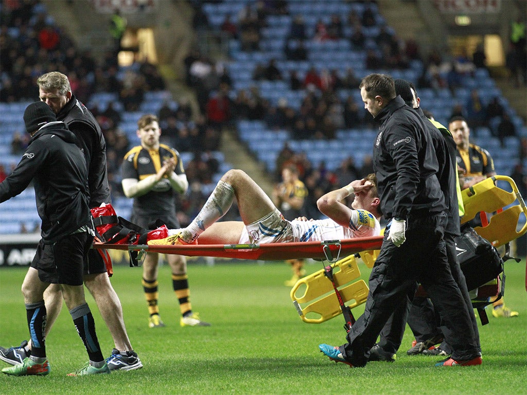 Exeter’s Henry Slade is carried off against Wasps on Saturday