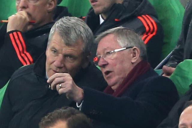 Former Chief Executive David Gill and former manager Sir Alex Ferguson of Manchester United watch from the directors' box