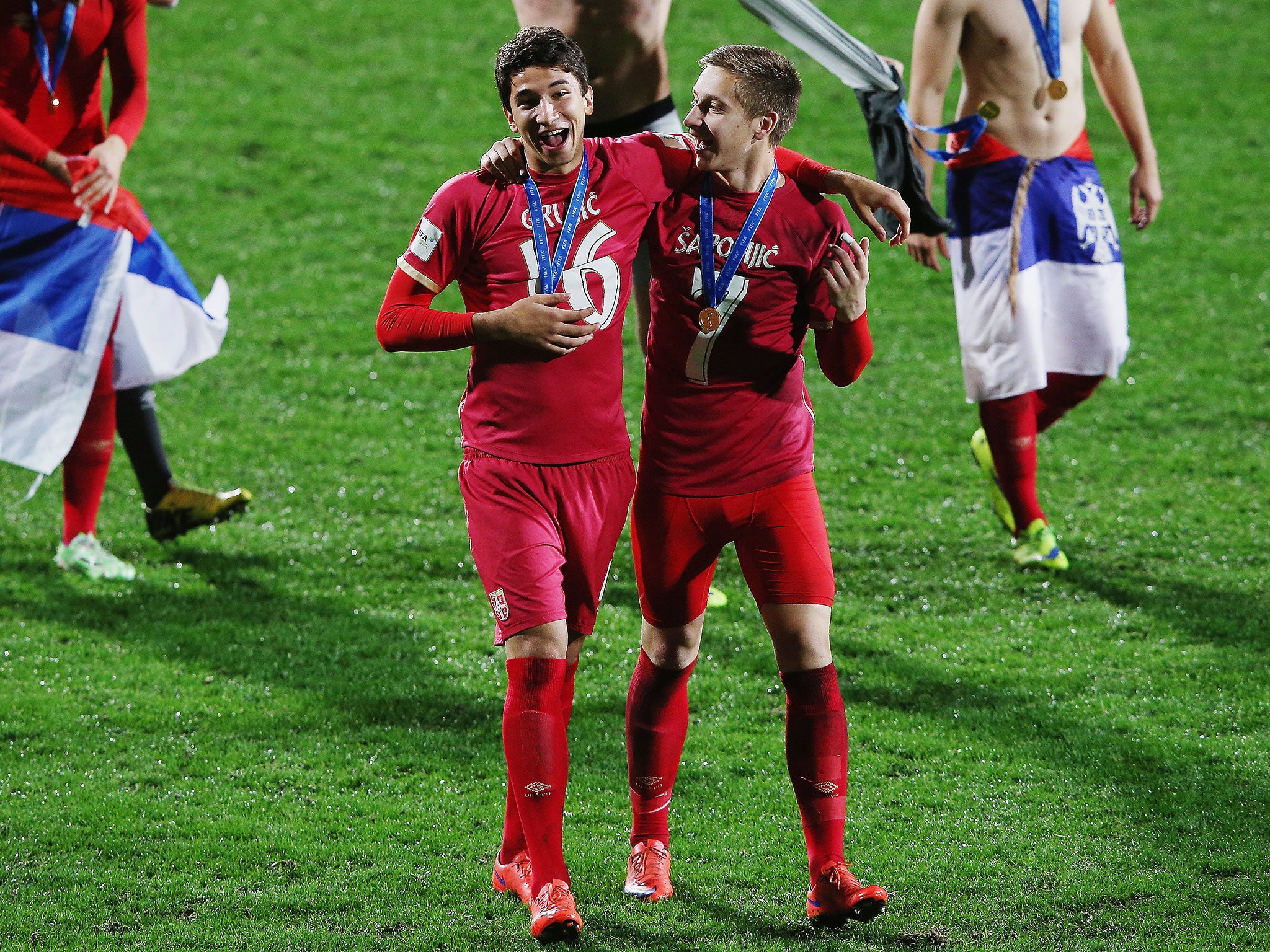 Marko Grujic (left) has been linked with a move to Liverpool