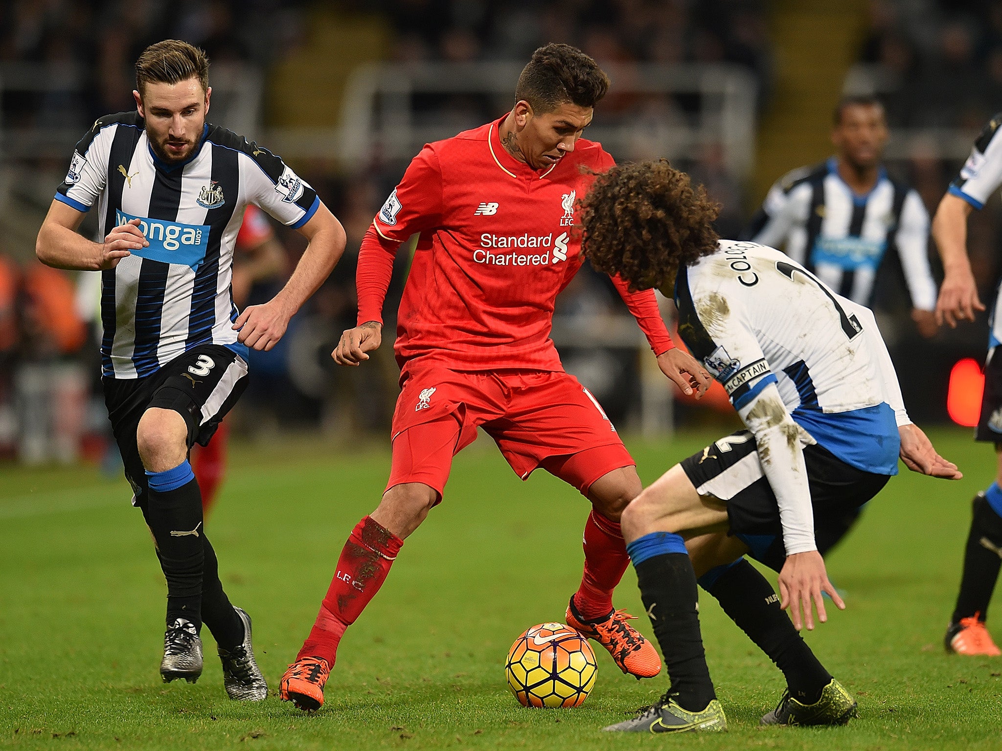 Roberto Firmino in action against Newcastle