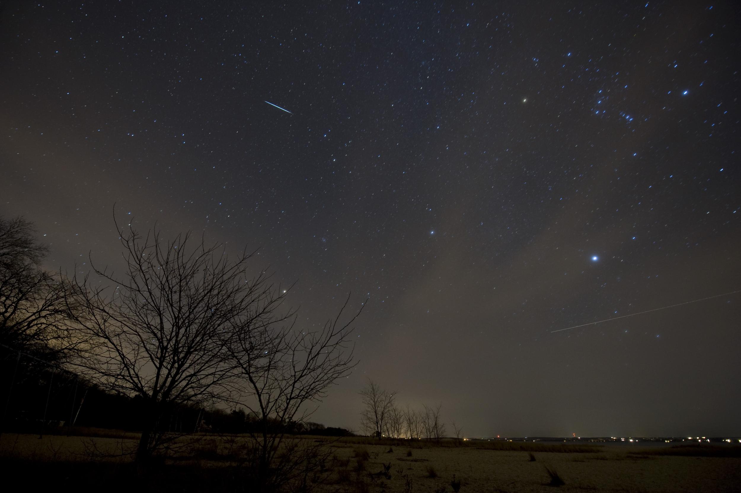 A Geminid meteor appears in the sky above New York during 2009's shower