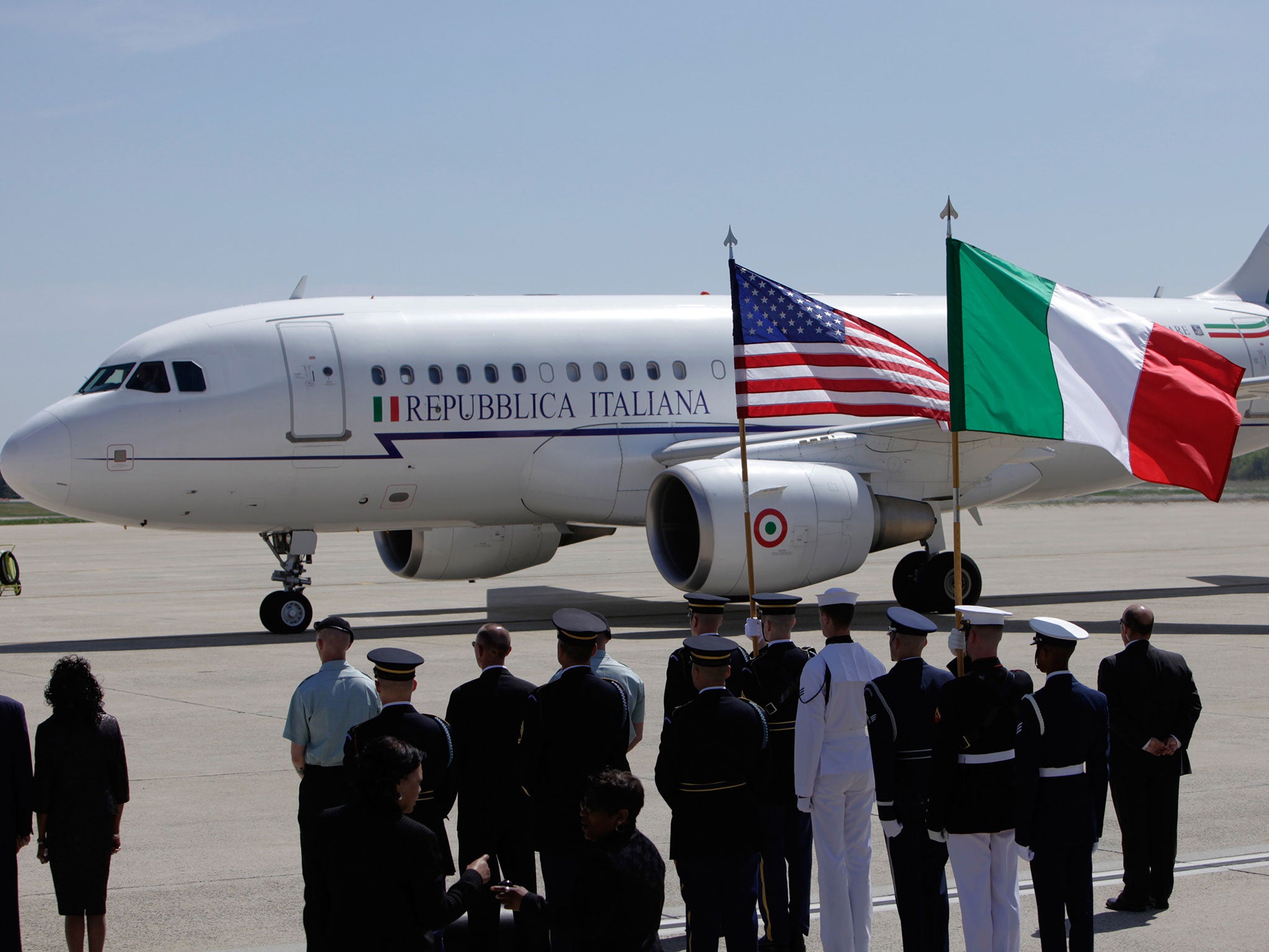 Italian Prime Minister Silvio Berlusconi arrives in his plane at the Andrews Air Force base April 12, 2010 to attend the Nuclear Security Summit in Washington, DC