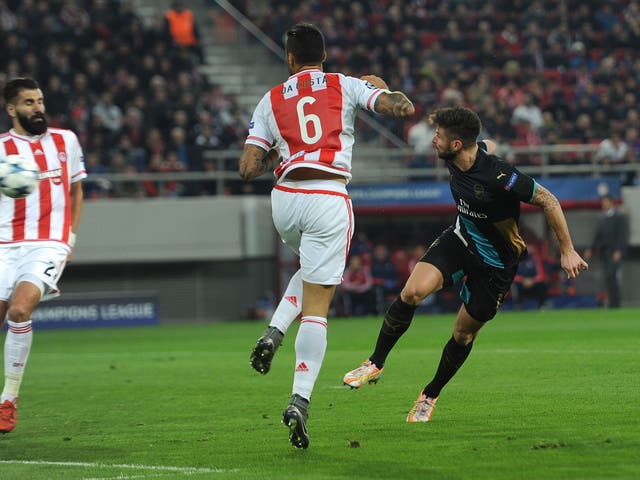 Olivier Giroud heads in his first of the game