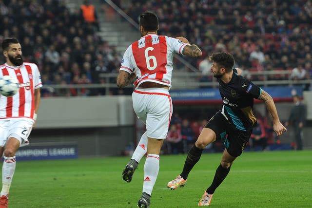 Olivier Giroud heads in his first of the game