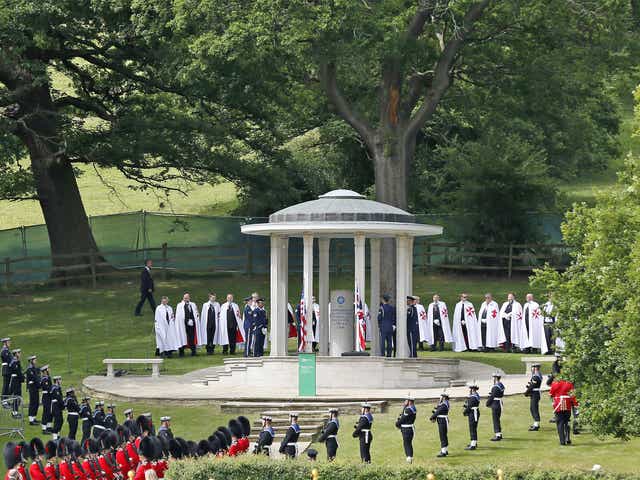 Leading the way... British soldiers join a parade to mark the 800th anniversary of the Magna Carta
