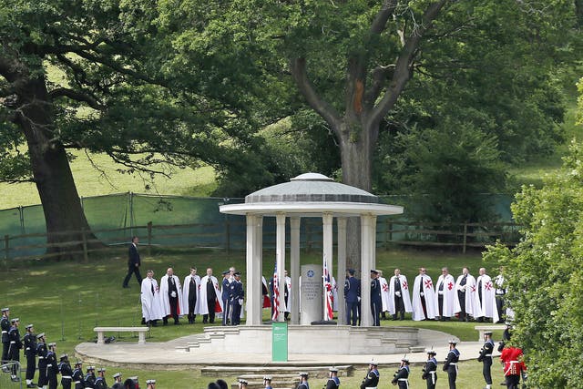 Leading the way... British soldiers join a parade to mark the 800th anniversary of the Magna Carta