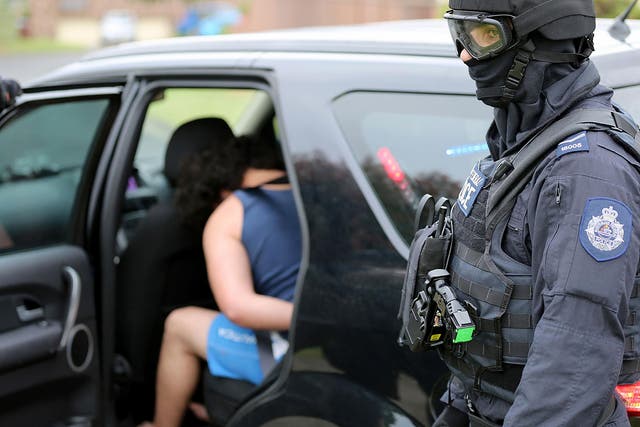 Five people have been arrested in connection with planning a terrorist act in the Australian capital