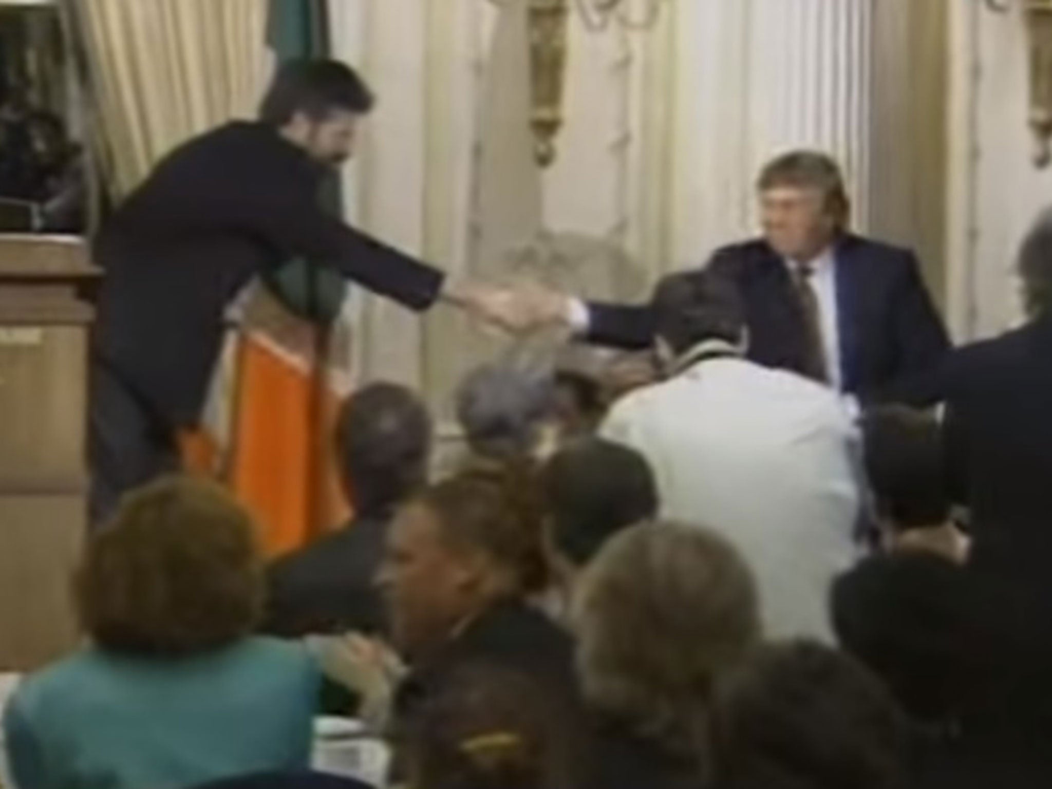 Gerry Adams shakes Donald Trump's hand at a Sinn Féin fundraiser at the Essex House hotel in Manhattan, 1995
