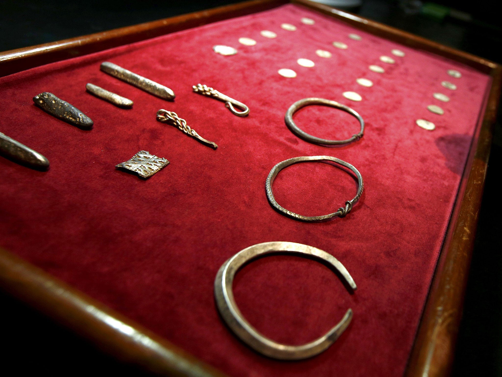 A Viking Hoard, silver arm-rings, silver ingots and rare coins of King Alfred of Wessex and King Ceolwulf II of Mercia, on show at the British Museum London Britain December 10, 2015.