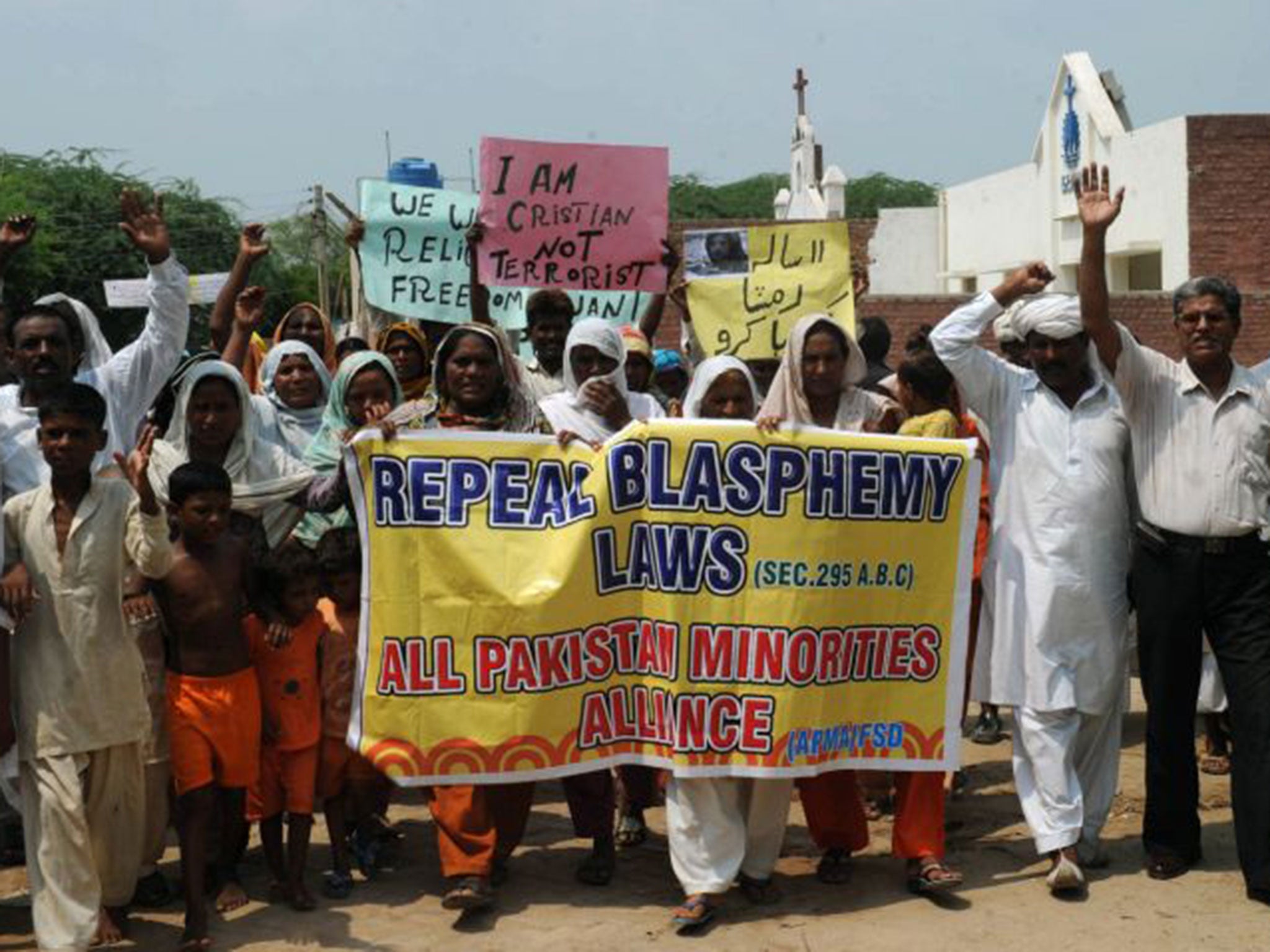 Christian villagers protest against blasphemy laws