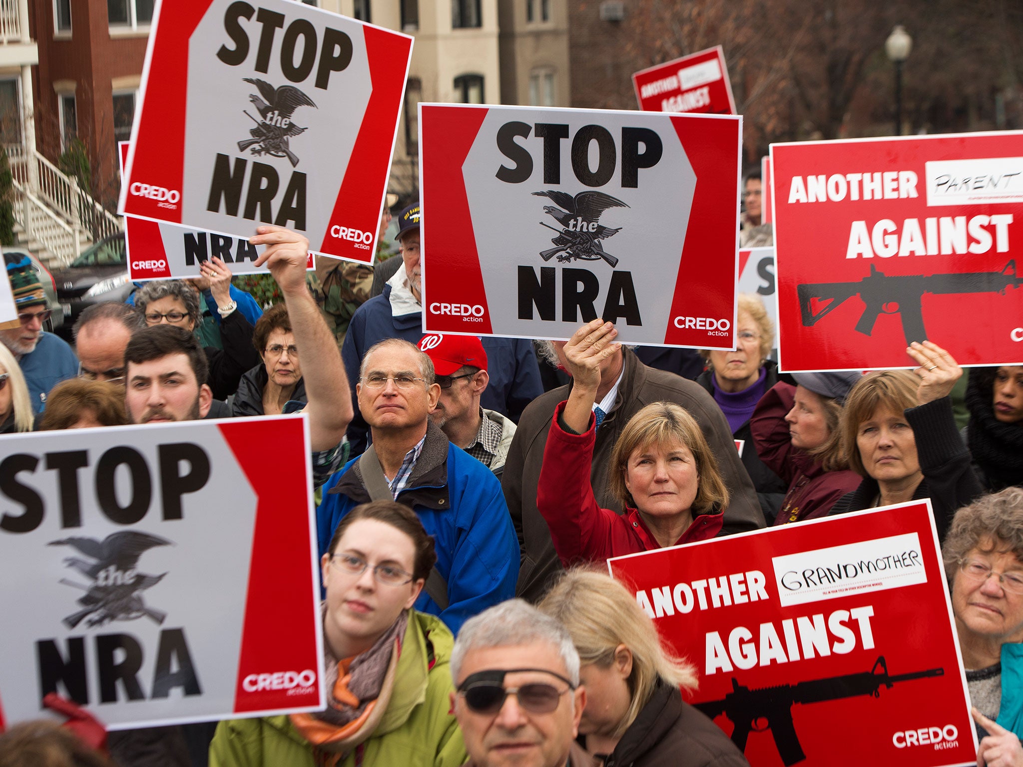A protest in reaction to the shooting at Sandy Hook Elementary School in December 2012. State law currently bans guns from college campuses, but that will change in 2016