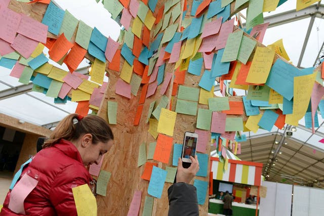 An installation at COP21 called the "solutions tree", where people are invited to post ideas and solutions to problems posed by climate change