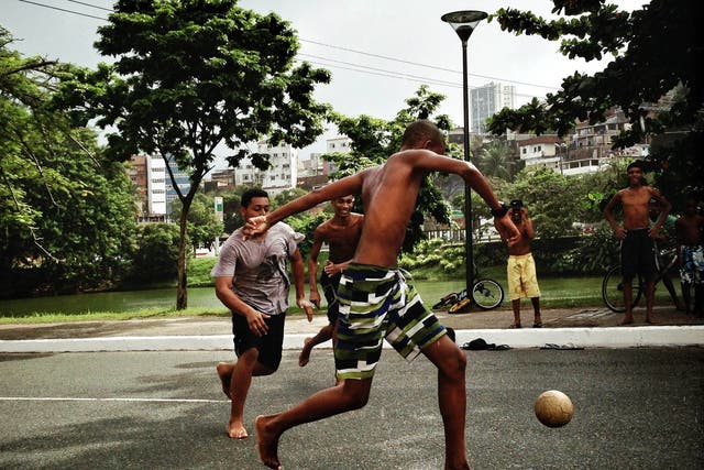 boys playing street football during the FIFA Confederations Cup Brazil 2013