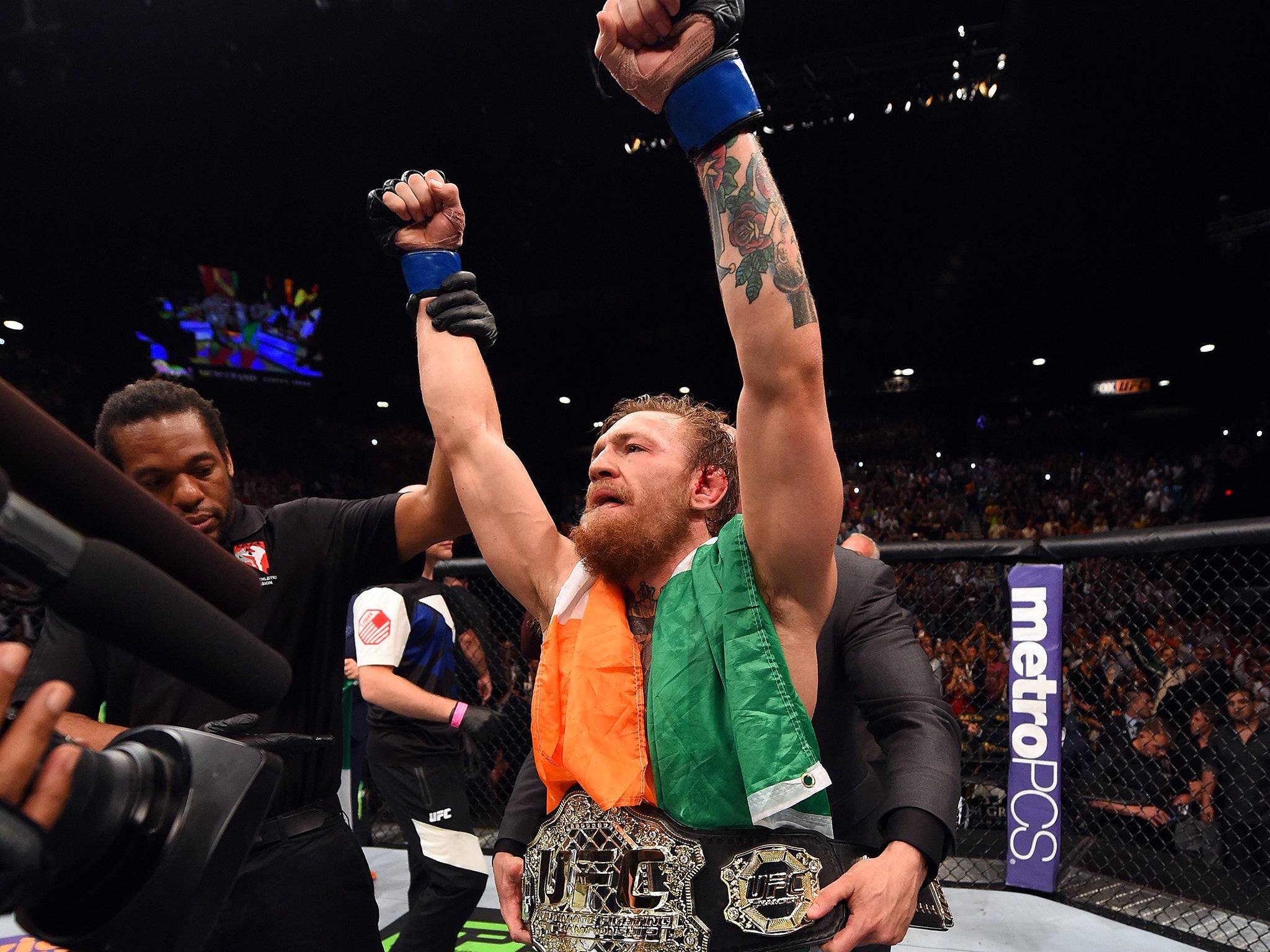 Conor McGregor with the interim Featherweight belt