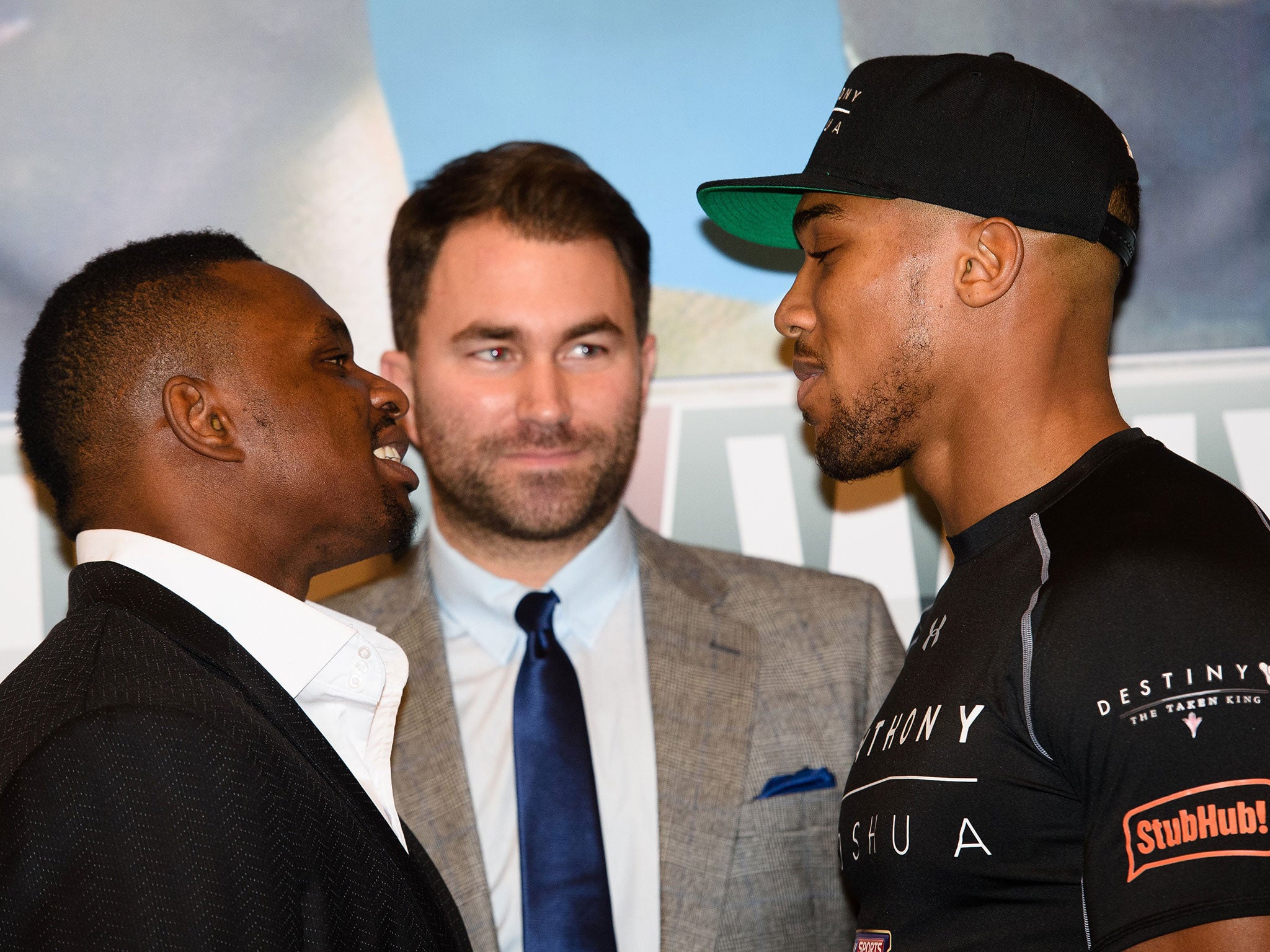 Dillian Whyte and Anthony Joshua face off with promoter Eddie Hearn looking on