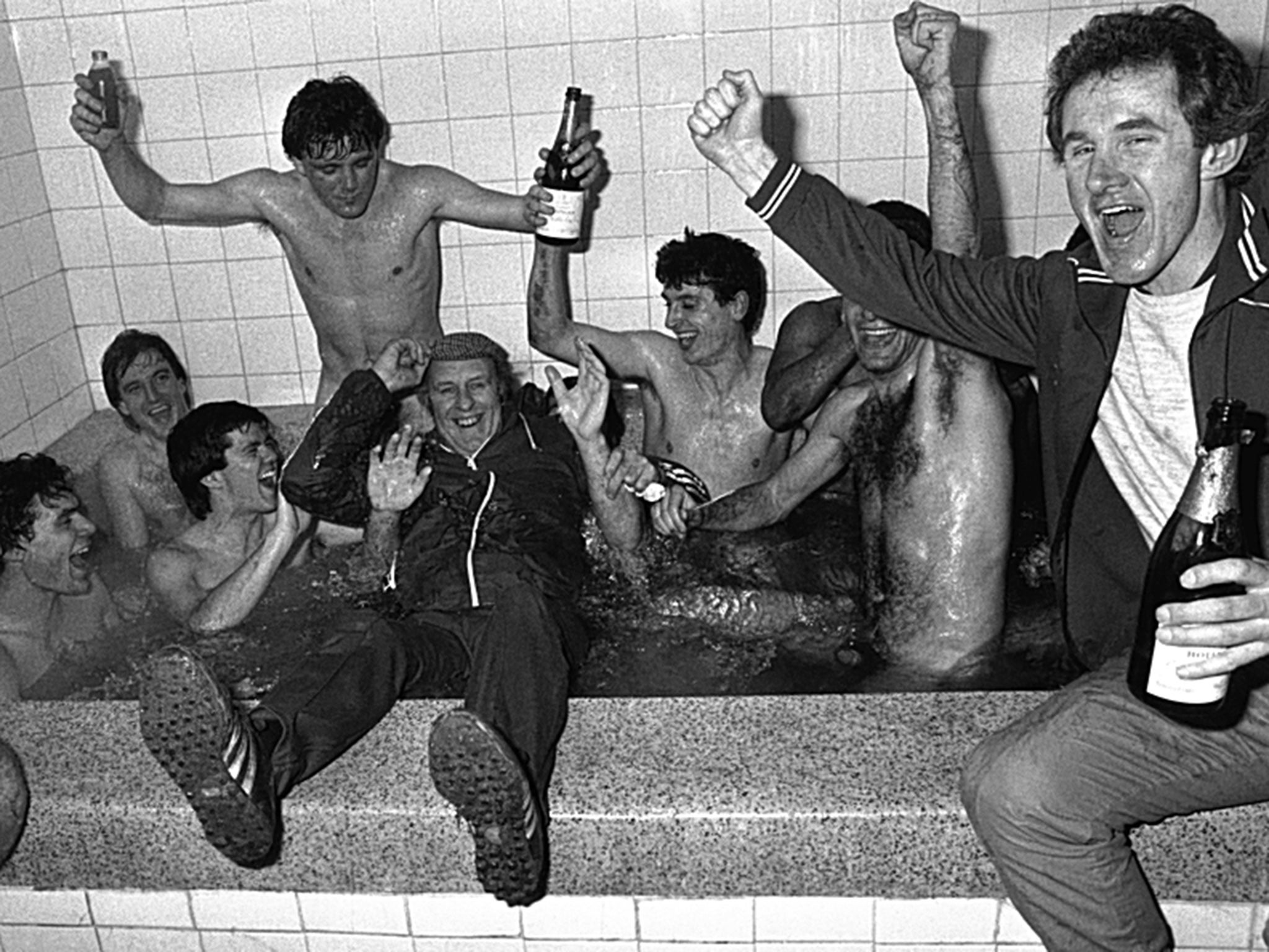 Bournemouth players and staff celebrate after their famous FA Cup win over Manchester United in 1984