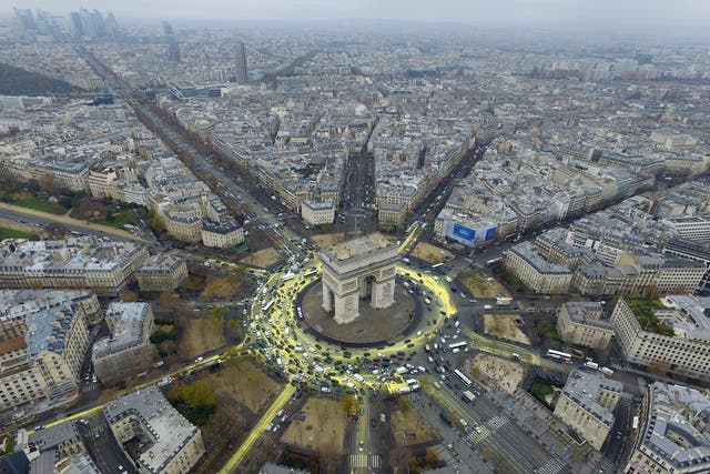 Aerial view of a Greenpeace protest at the Place de L'Etoile during the COP21 World Climate Change Conference 2015, in Paris, France