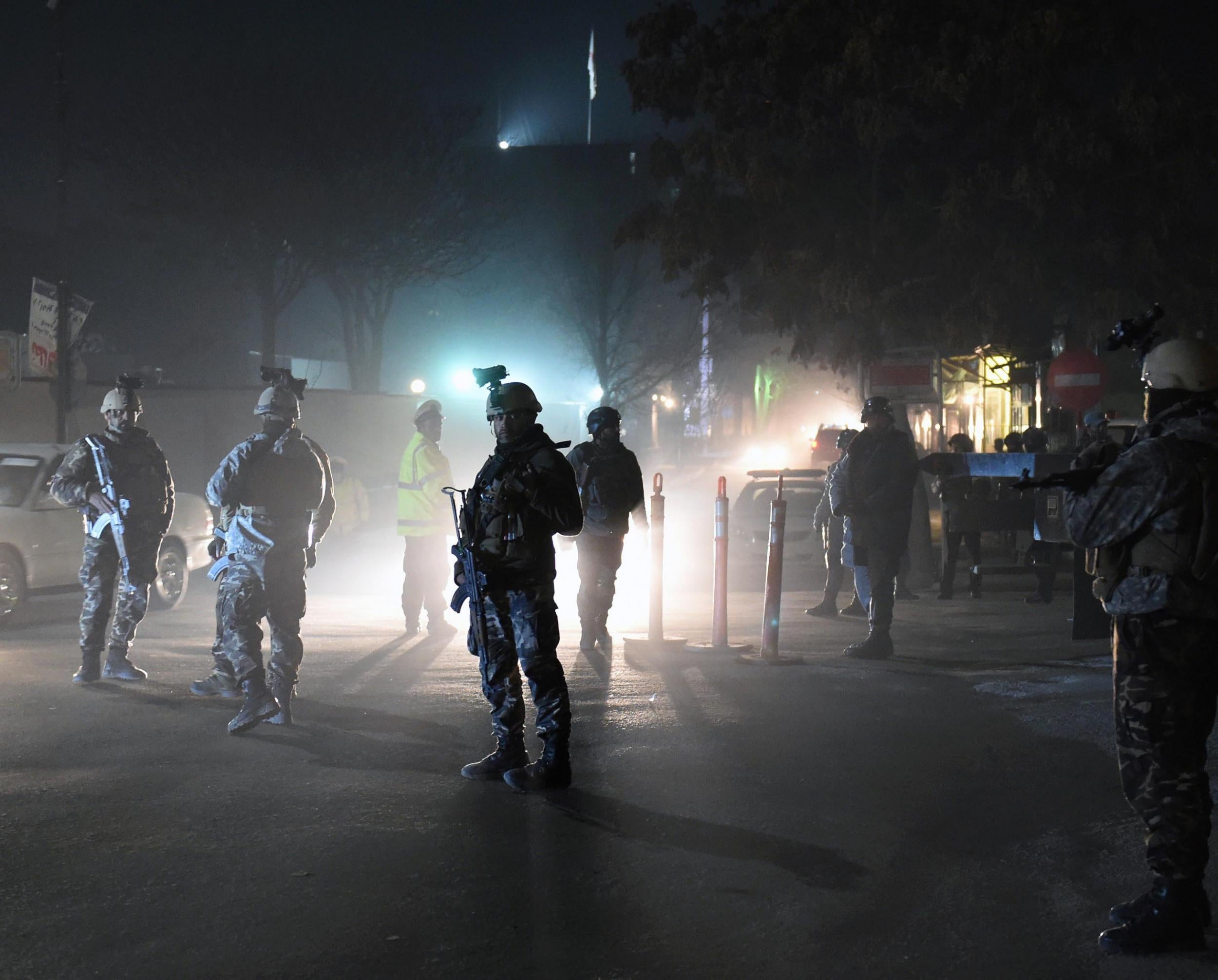 Afghan police outside the Spanish embassy attacked by Taliban fighters on Friday night