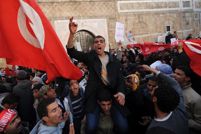 Tunisians demonstrating in front of the government palace in Tunis in January 2011