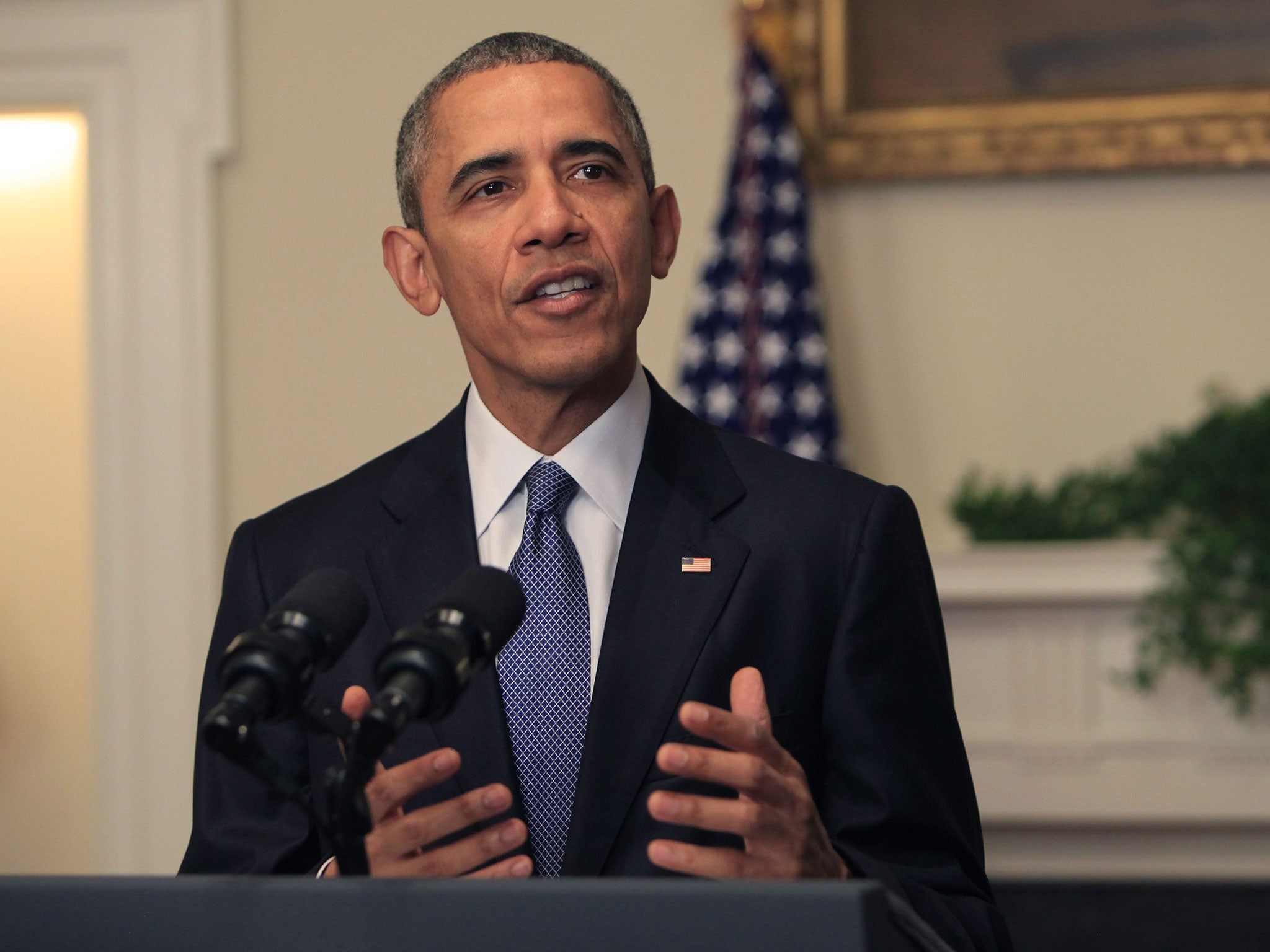 Barack Obama makes a statement on the Paris climate agreement in the Cabinet Room of the White House on 12 December 2015