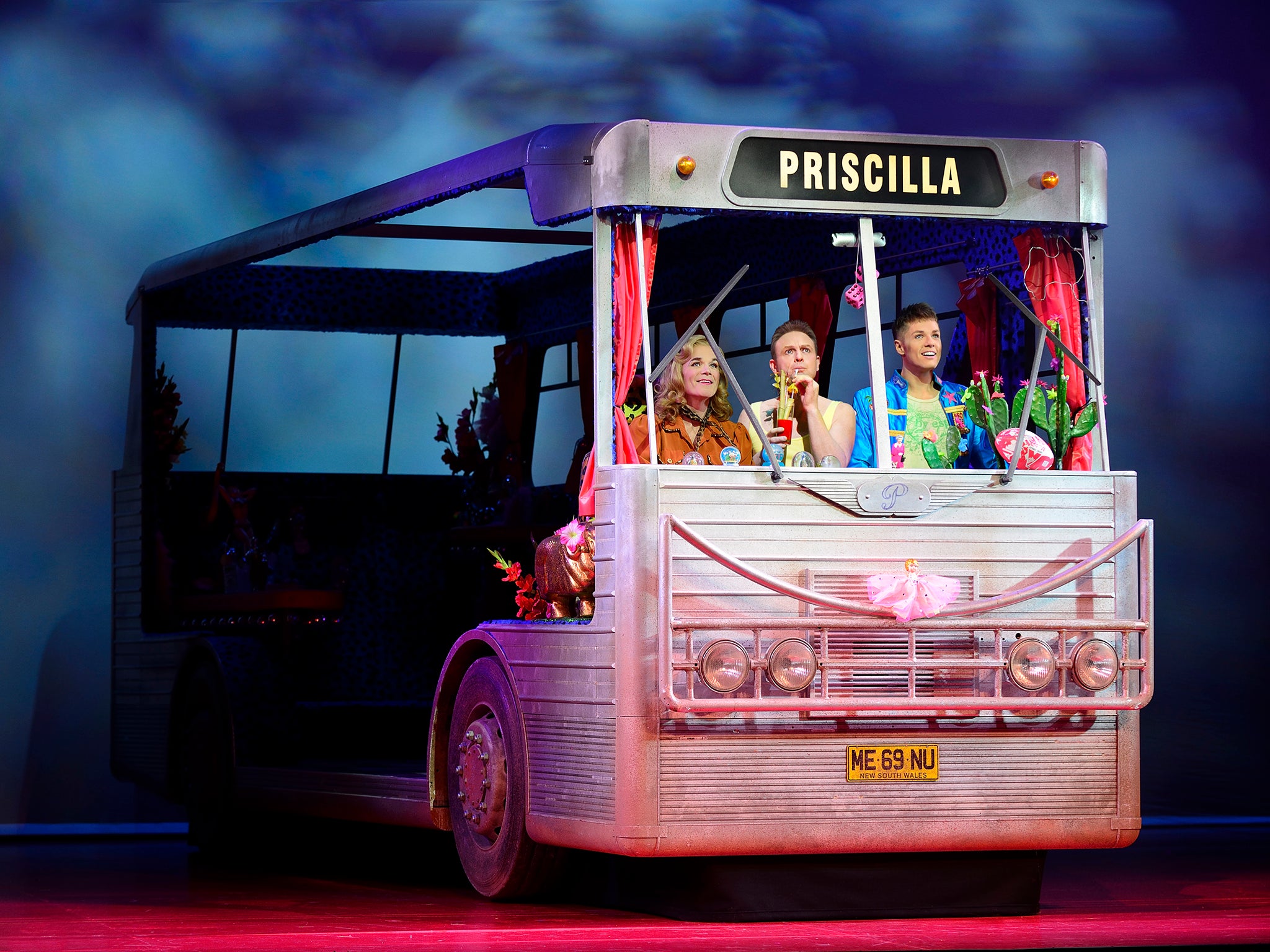 Simon Green as Bernadette, Jason Donovan as Tick and Adam Bailey as Adam in Priscilla Queen of the Desert
