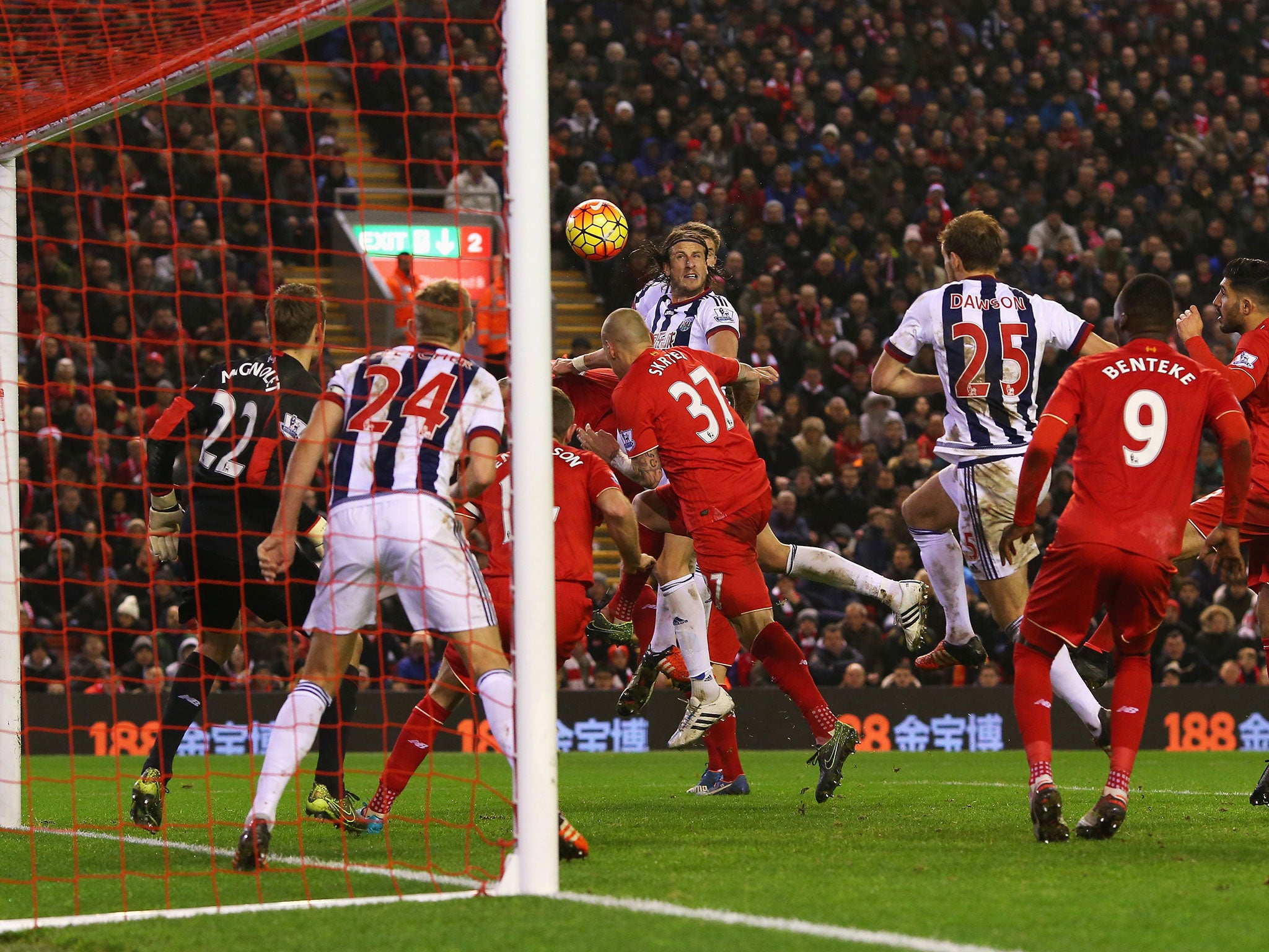 Jonas Olsson heads West Brom into the lead against Liverpool