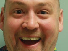 Man arrested for possession of magic mushrooms has happiest mug shot o