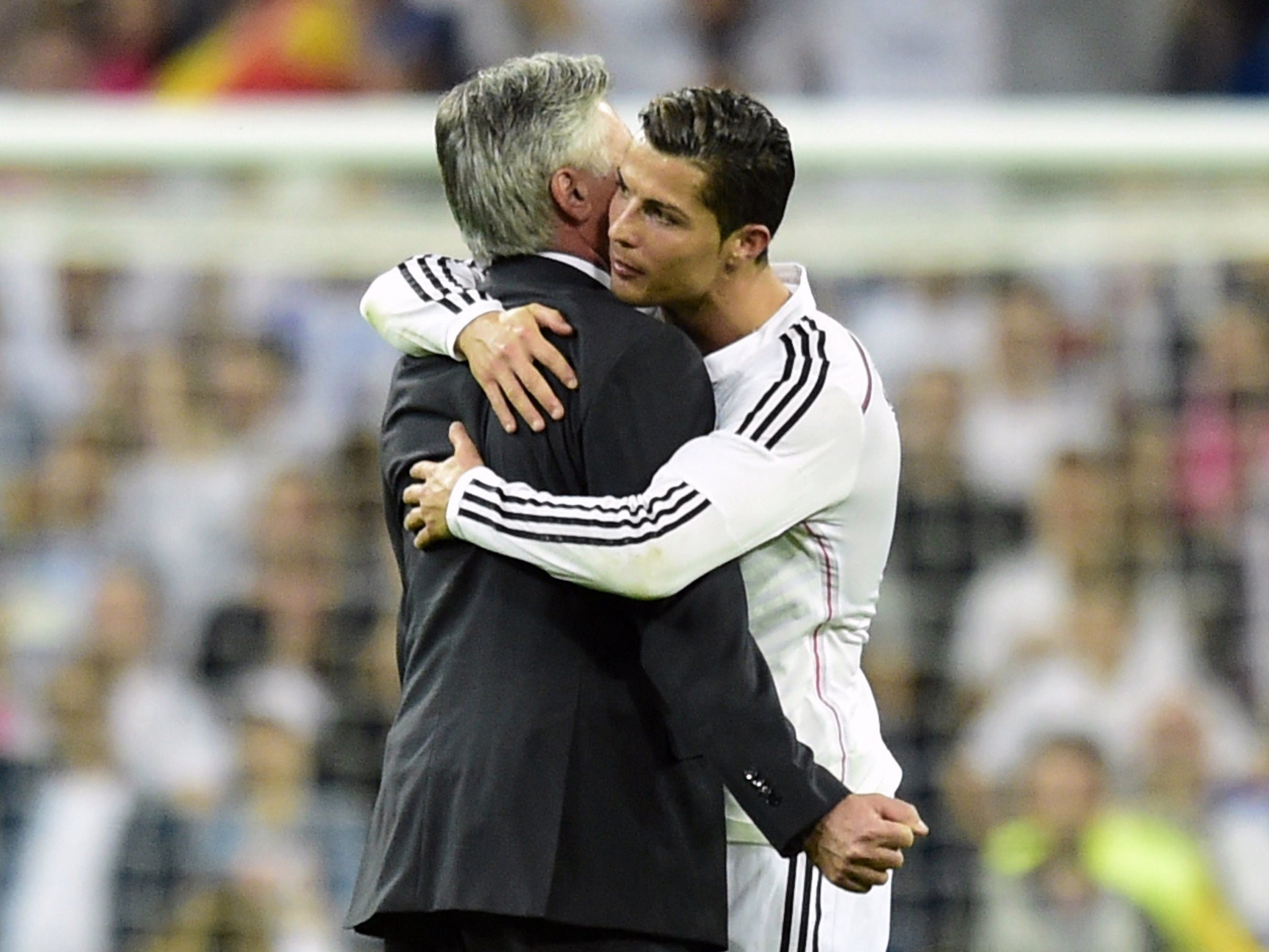 Cristiano Ronaldo embraces Carlo Ancelotti after Real Madrid's win over Barcelona back in October 2014