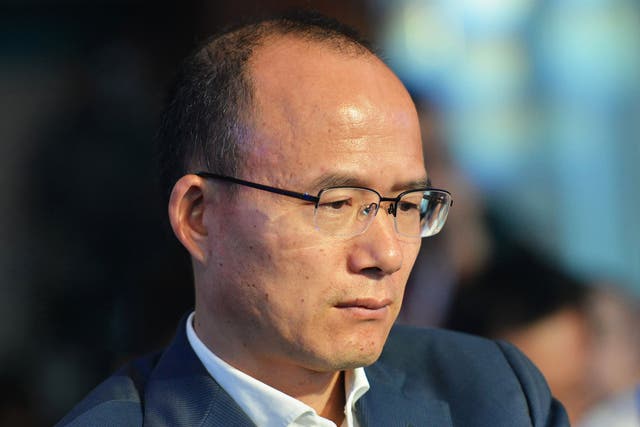 This photo taken on June 25, 2015 shows Guo Guangchang, the chairman of one of China's biggest private-sector conglomerates, Club Med owner Fosun, attending a conference in Hangzhou, in eastern China's Zhejiang province. Fosun said on December 11, 2015 its chairman Guo Guangchang was cooperating with judicial authorities over a reported corruption investigation