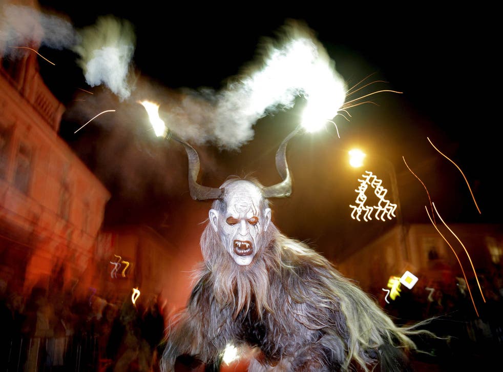 A man dressed as a devil performs during a Krampus show in the southern Bohemian town of Kaplice