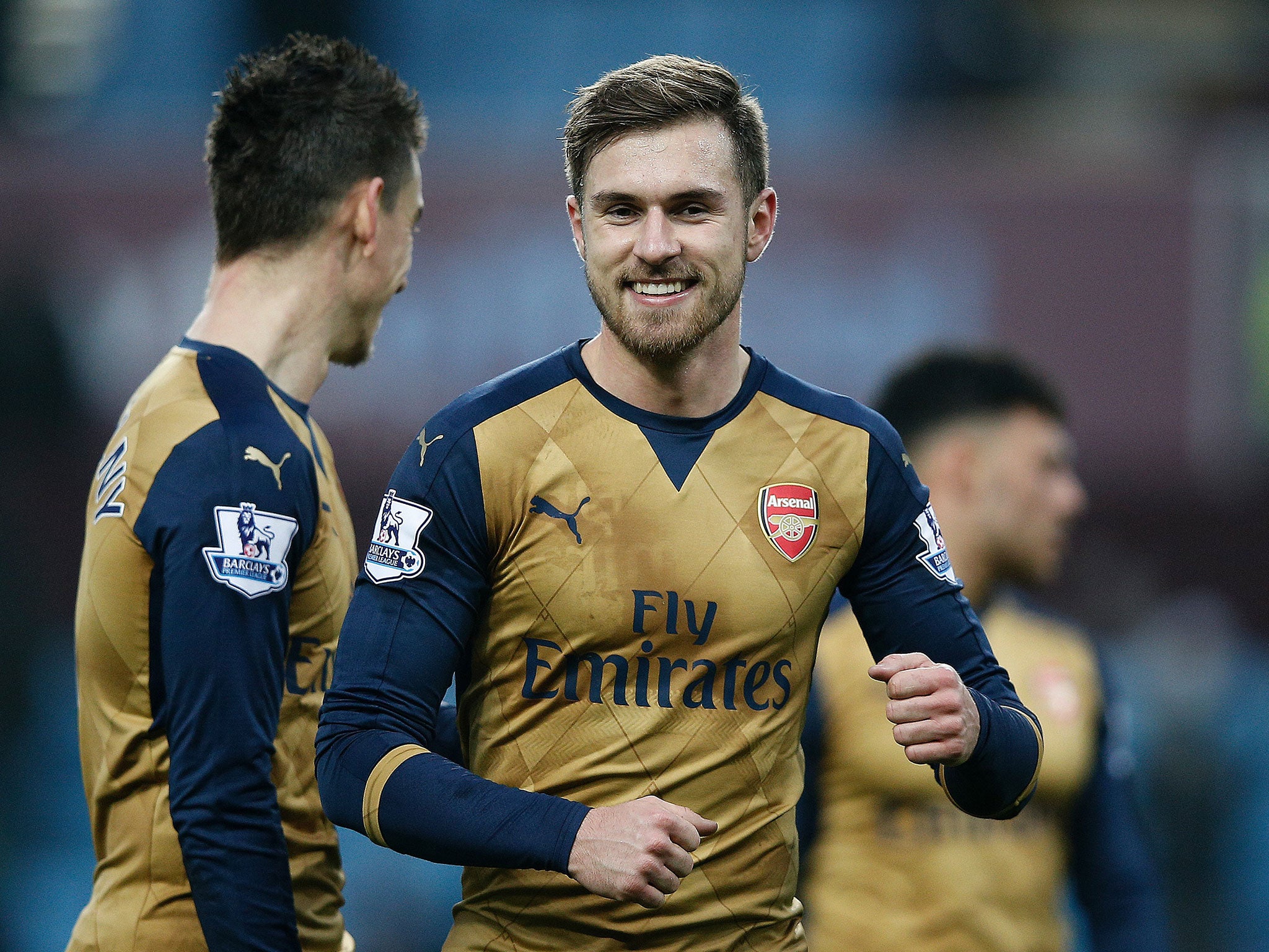 Arsenal midfielder Aaron Ramsey celebrates scoring against Aston Villa