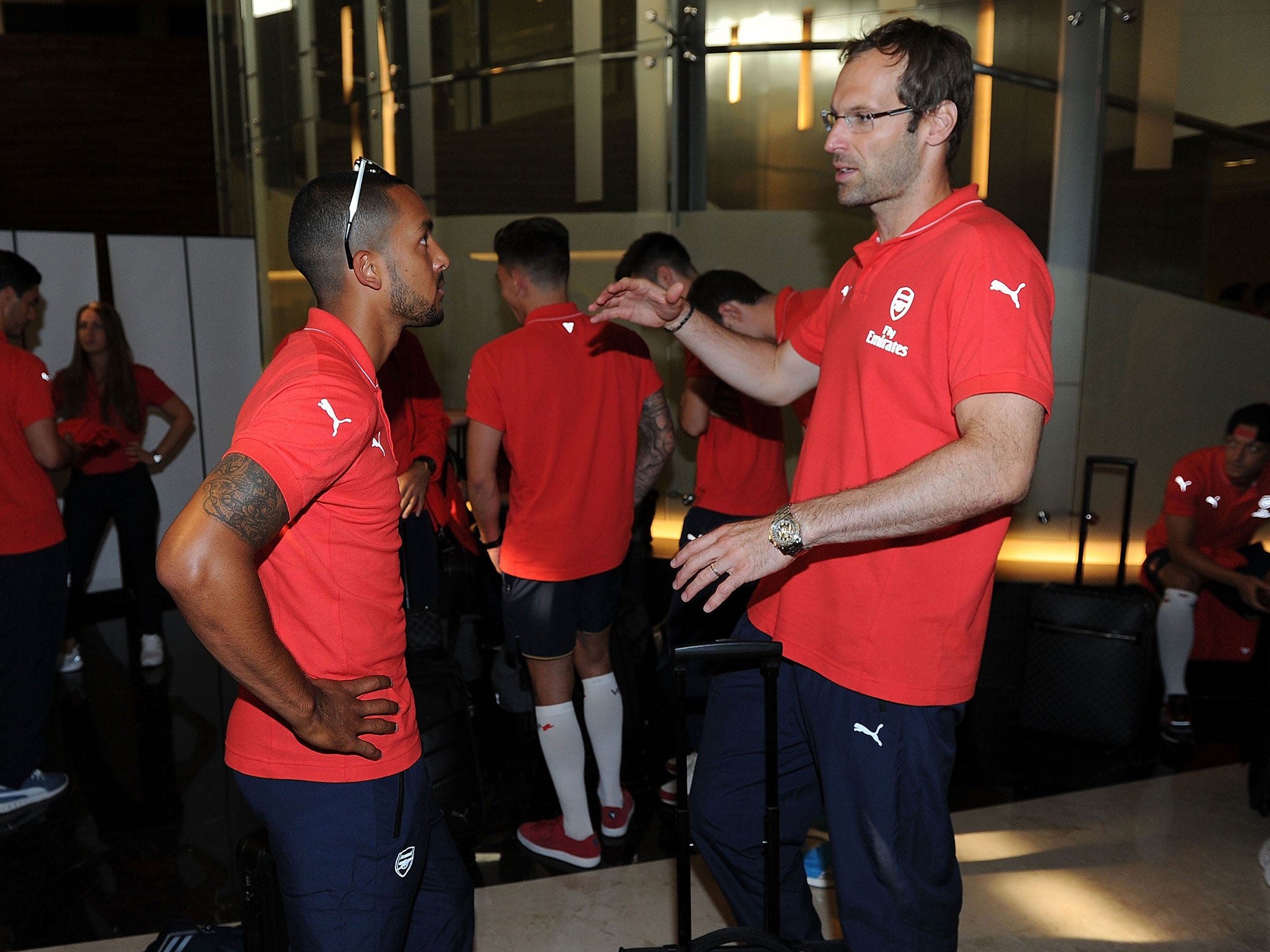 Theo Walcott and Petr Cech